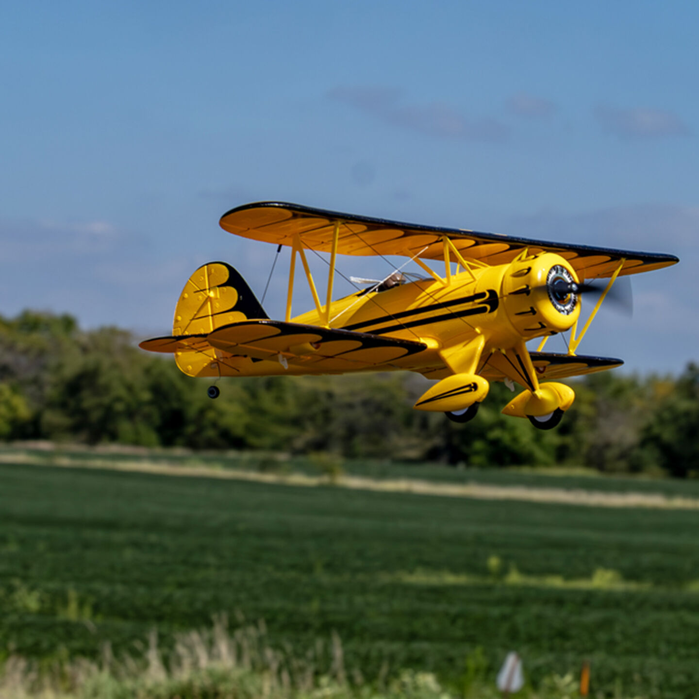 RC biplane flying in the air.  Click to browse all RC airplanes, RC  jets, and RC flying simulators.