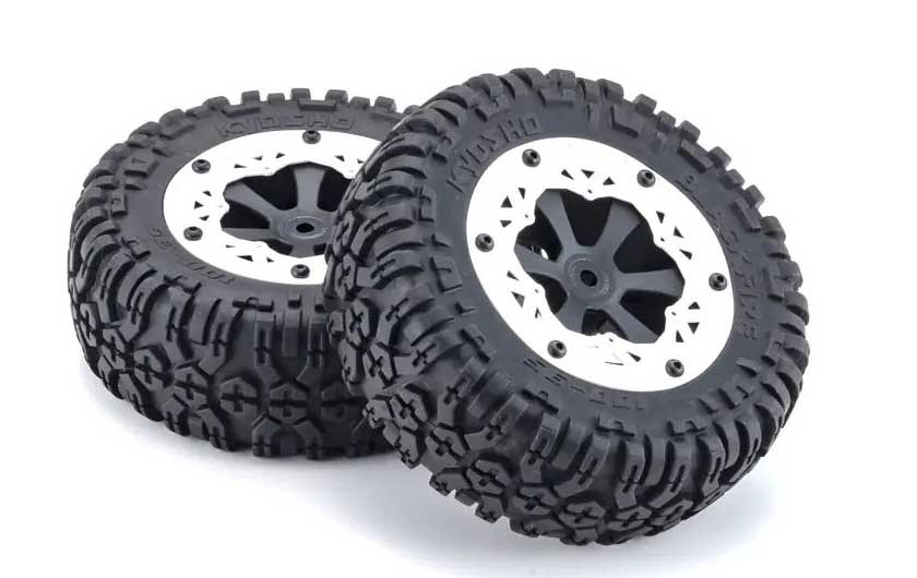 Tires have a blocked pattern on white wheels for off-road and on-road driving